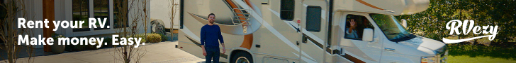 RV owner with his motorhome parked at home